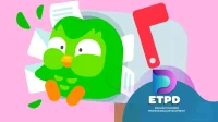 Duolingo bird is standing next to a mailbox
